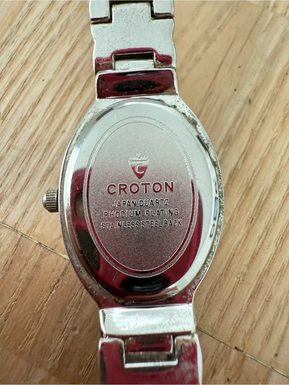 Croton ladies oval silver tone crystal watch NEW BATTERY